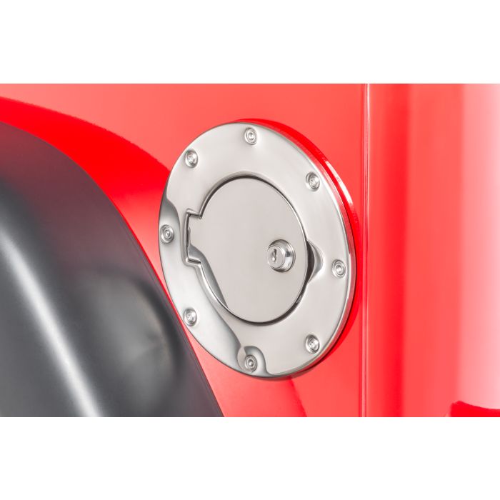 OMIX LOCKING GAS COVER POL SS 97-06 TJ